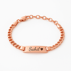 Rose gold bracelet with engraved name 'Sahil' on a white background
