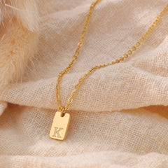 Dainty Initial Tag Necklace by Artsy Store