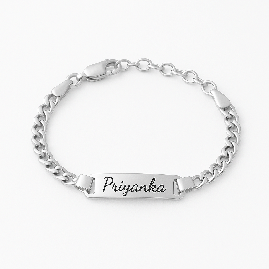 Silver chain bracelet with a nameplate on a white background