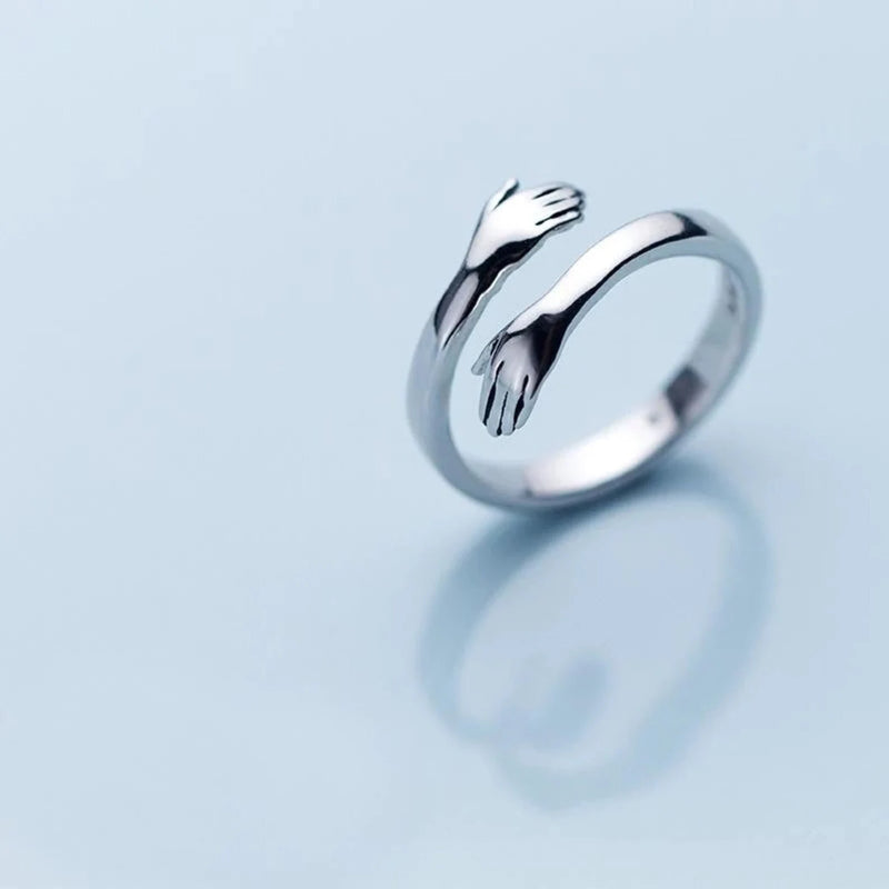 SILVER LOVE HUGGING HAND RING